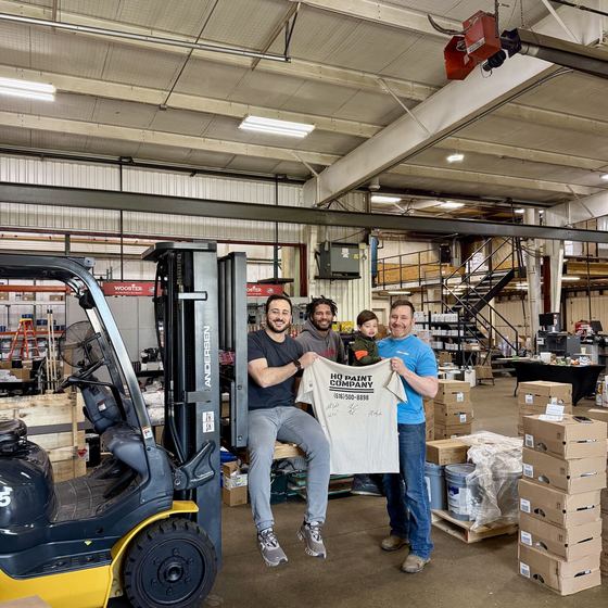 The team at HQ Paint Company in Grand Rapids, MI, a Rundoo client