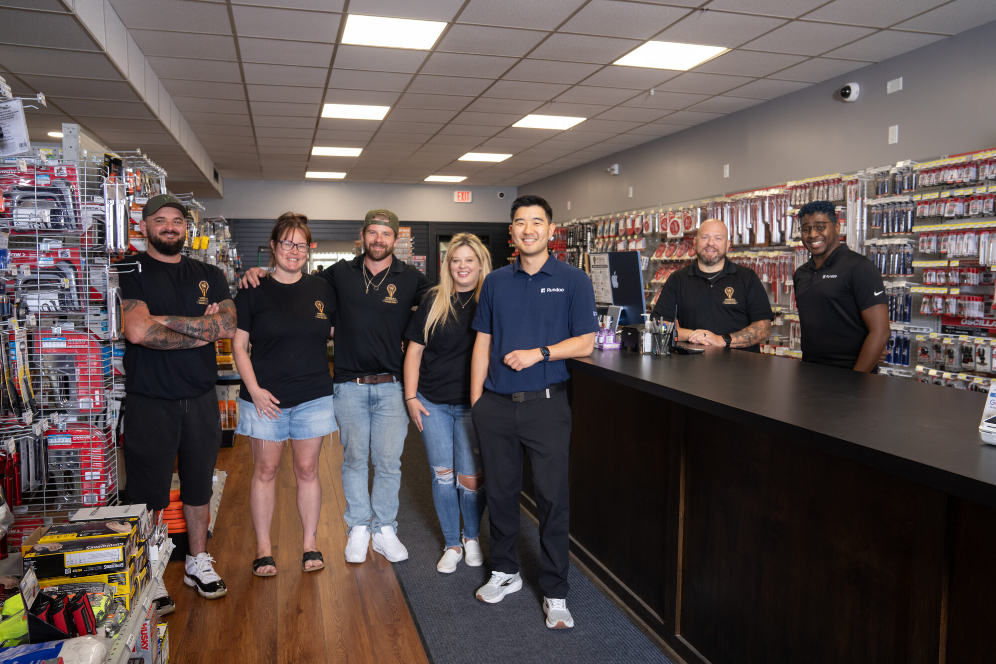 The Wigal Hardware team at the store counter on go-live day